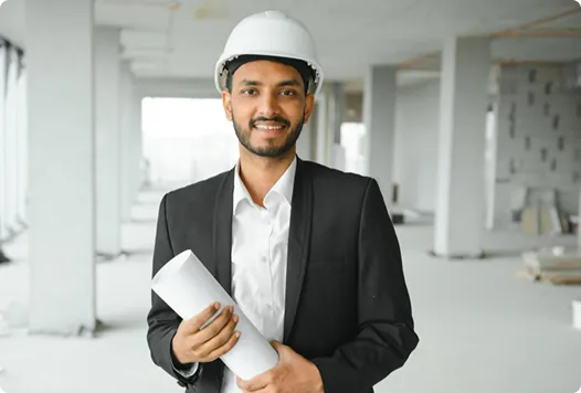Plant HR professional holding documents at a construction site