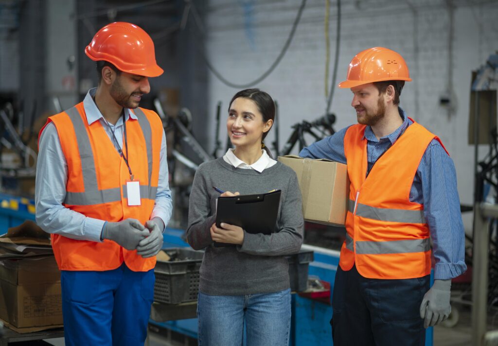 People in safety equipment at their workplace